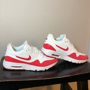 White and red Nike AirMax.